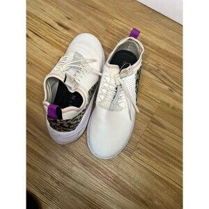 Clove Women's Classic shoe in Brilliant White with a purple accent woman’s 7